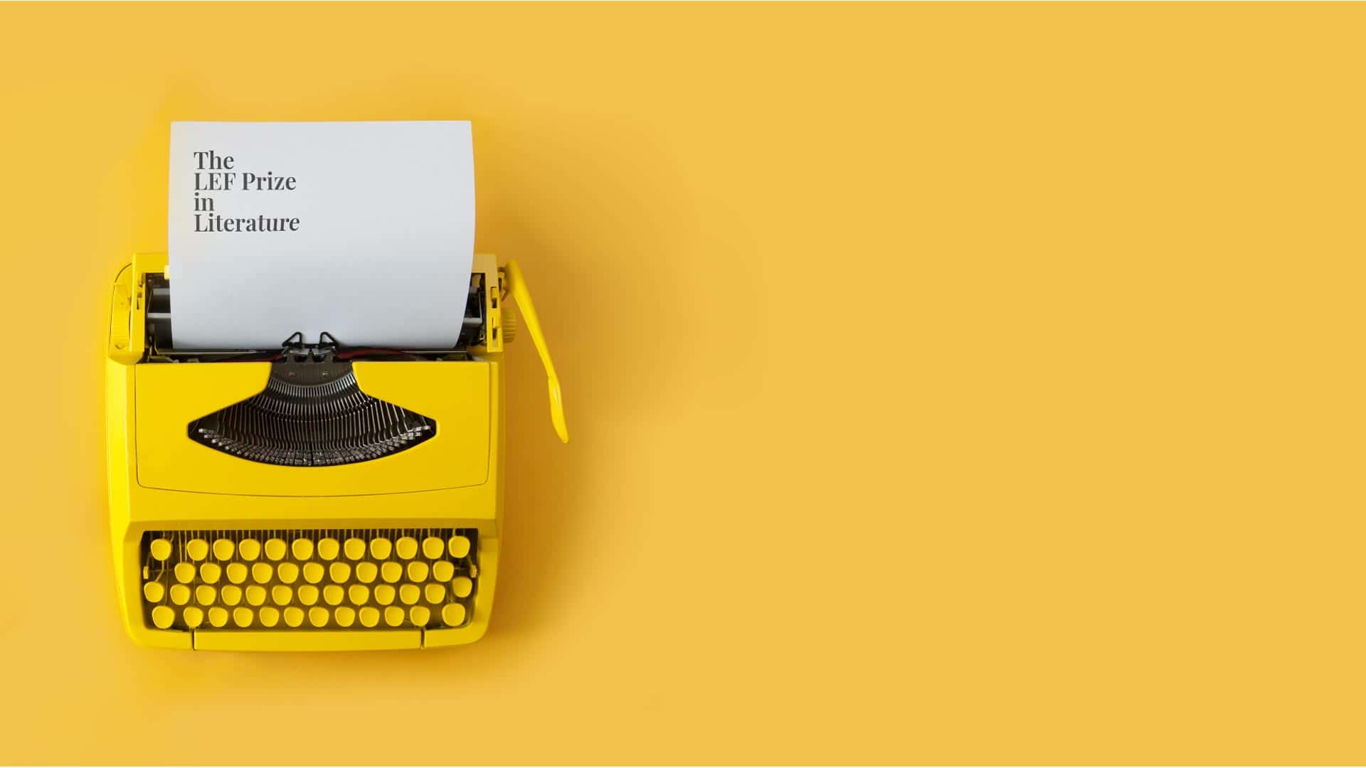 Yellow retro typewriter - key image for impact idea LEF Prize in Literature