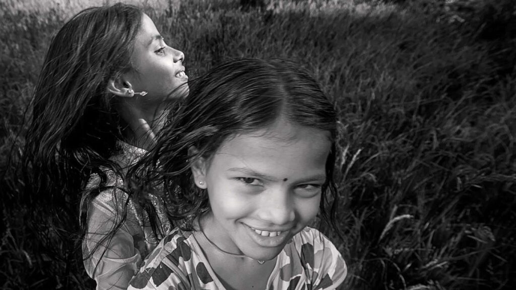 Girls playing in field