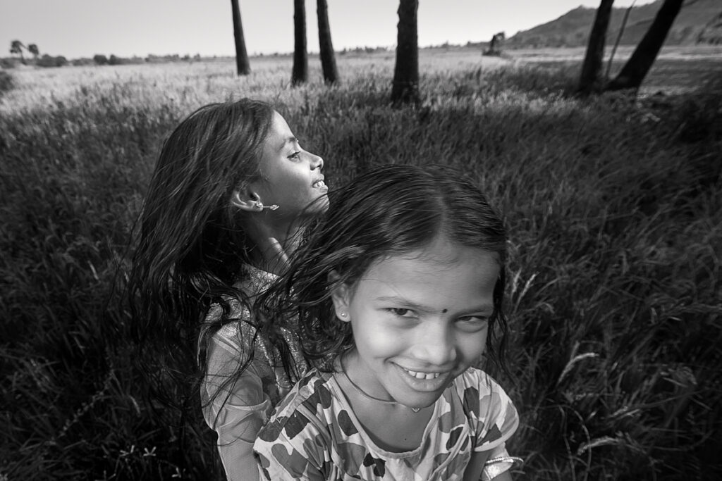 Girls playing in field