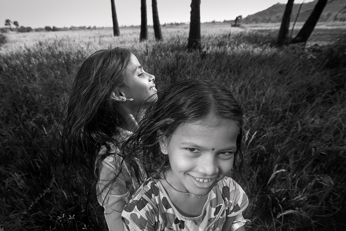 Girls playing in field